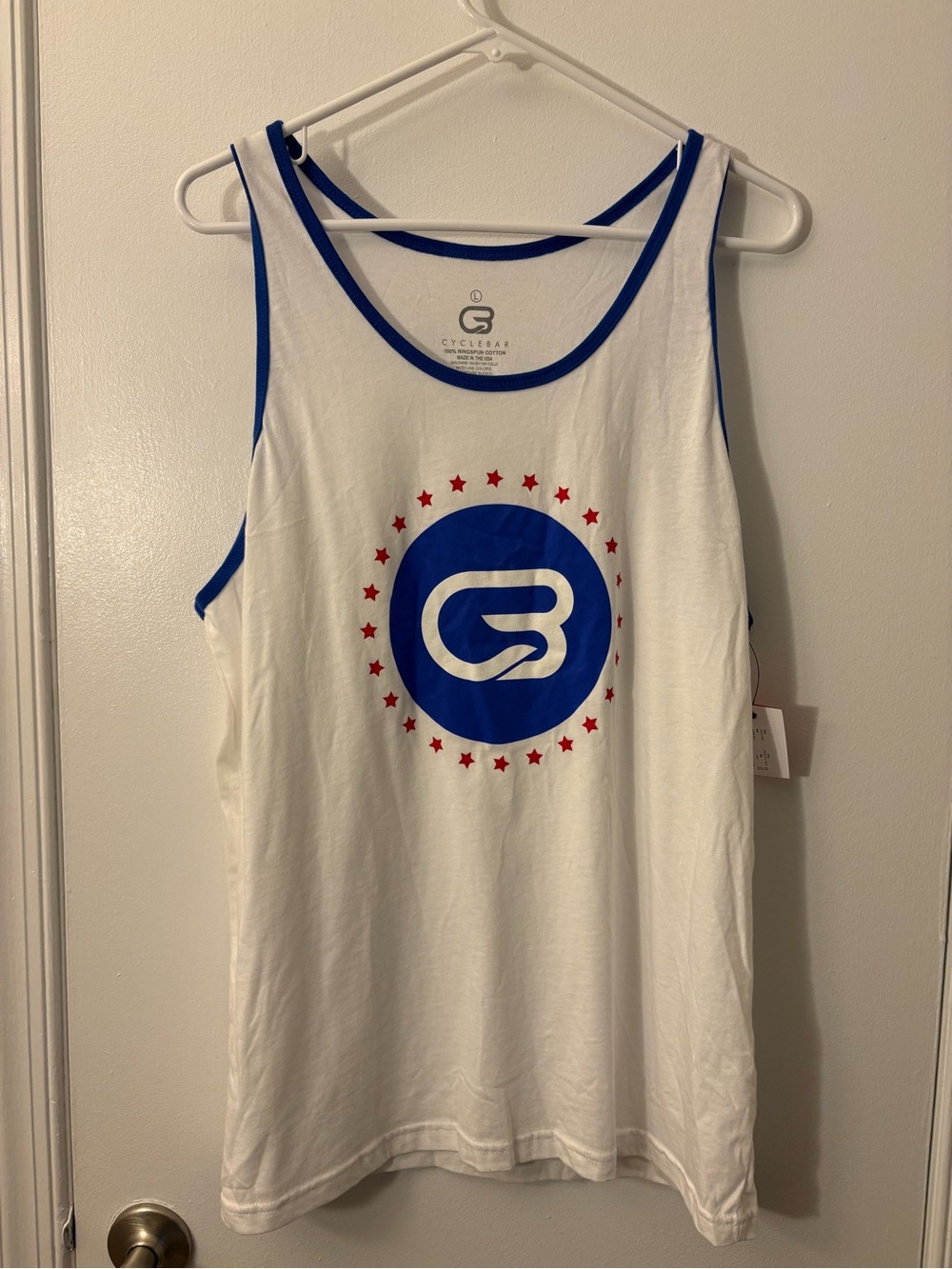 Cyclebar White Tank with Blue Trim and Red Stars